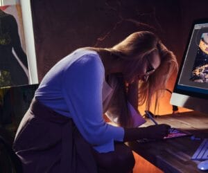 Young woman is working at home office